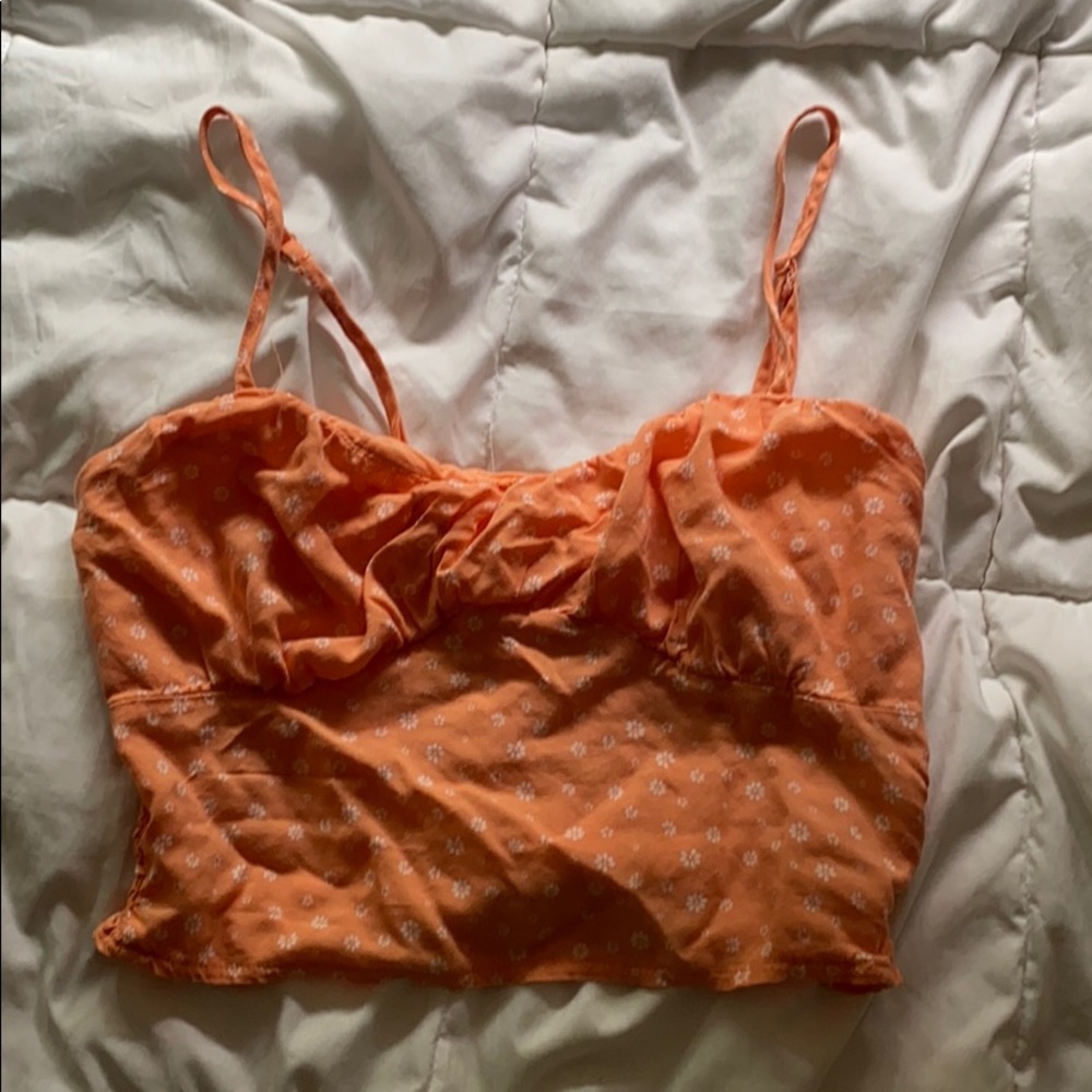 Orange crop top fits very well